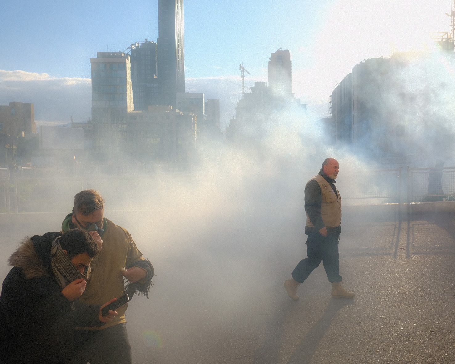 th_cak-00013 Protesters running from tear gas on the day of Parliament’s confidence vote. 11 February 2020.